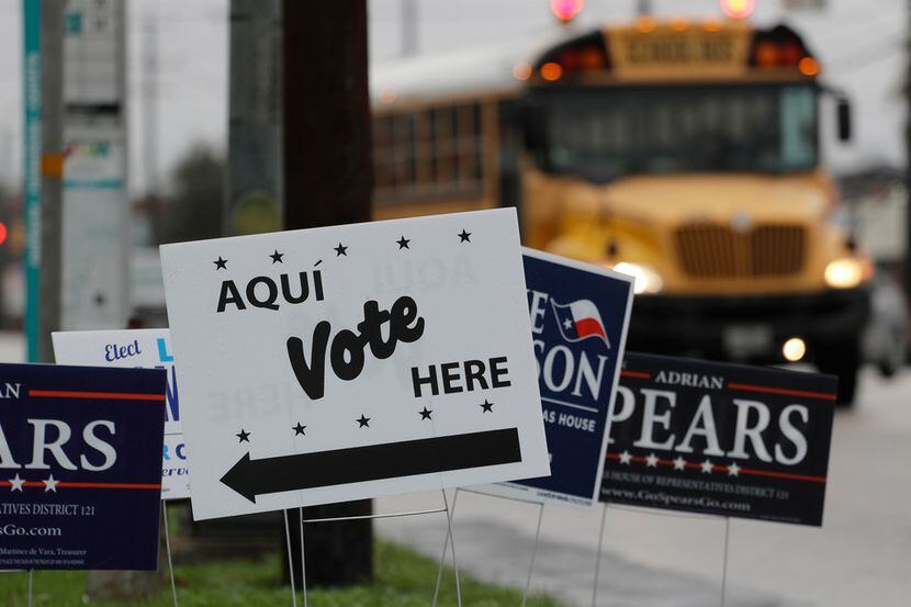  Signs mark a polling site in March 2018 in San Antonio.