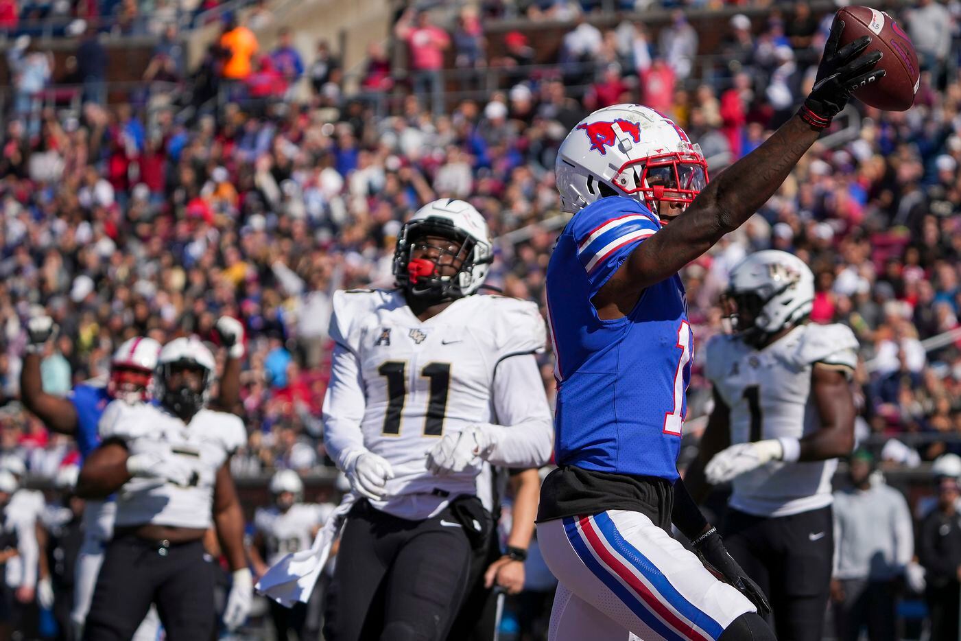 SMU wide receiver Rashee Rice (11) celebrates as he scores on a 8-yard touchdown pass during...