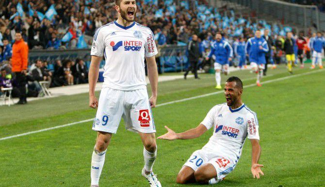Andre-Pierre Gignac (izq.) viene de jugar con el Olympique de Marsella donde la temporada...