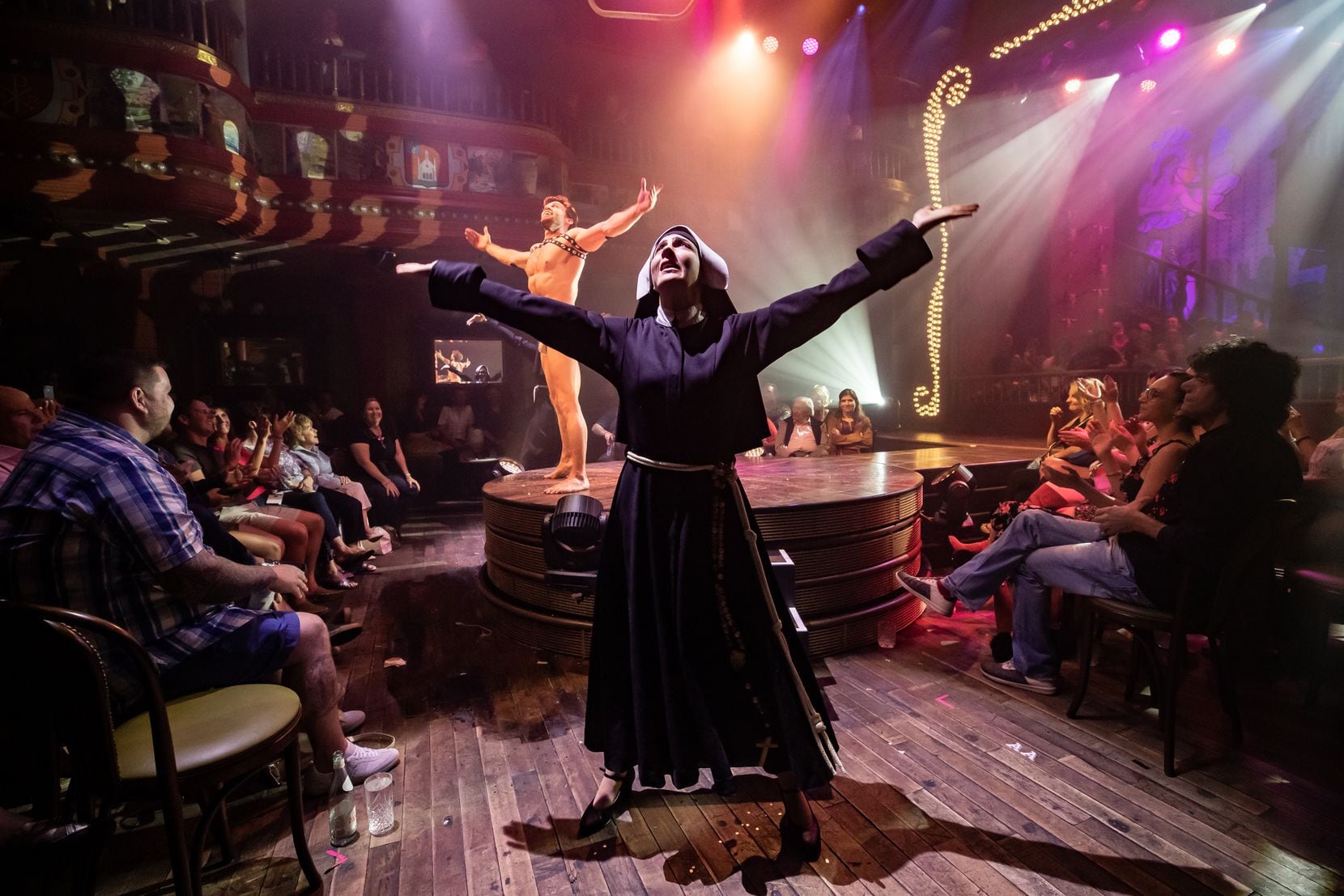 "Atomic Saloon Show," set in a fictitious Wild West town near an atomic test site, is a brilliant blend of comedy, acrobats, vaudeville and burlesque.