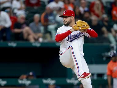 Texas Rangers starting pitcher Martin Perez (54) delivers a pitch during the seventh inning...