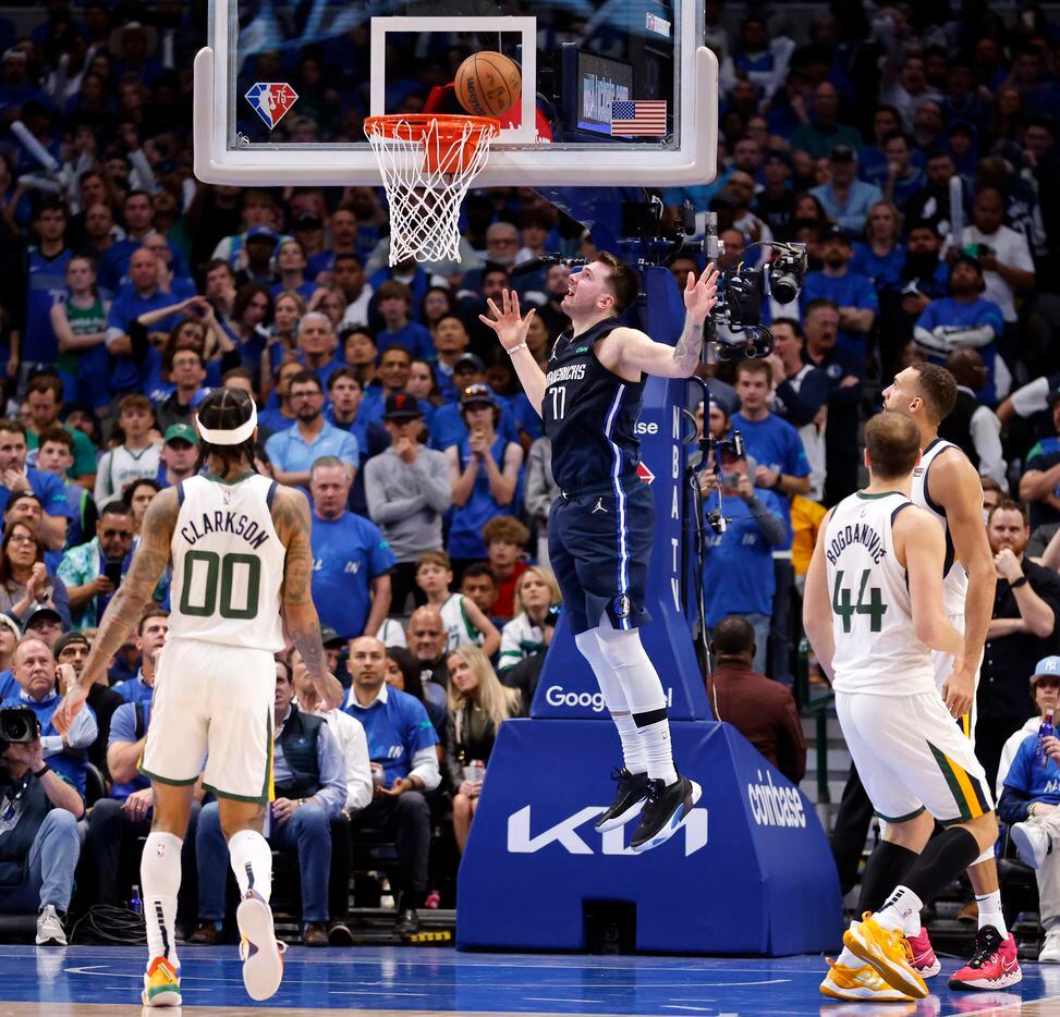 Dallas Mavericks guard Luka Doncic (77) floats in a shoot against the Utah Jazz during the...
