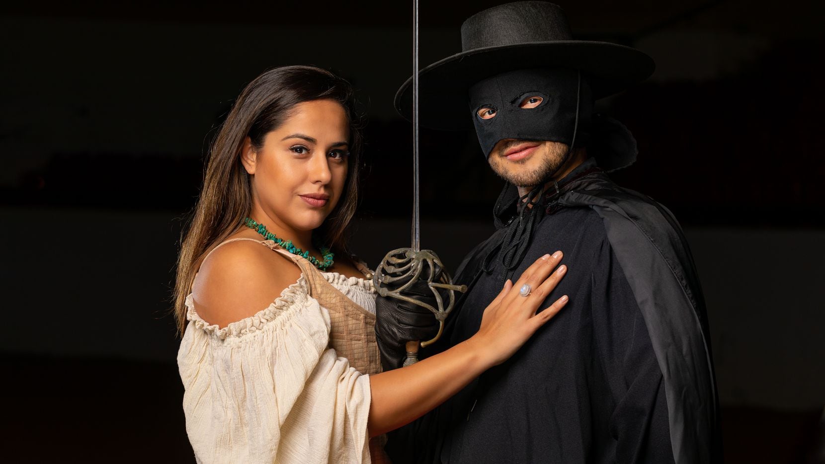 Actors Sixto Orellana and Edna Garcia pose as Zorro and Ana Maria, respectively, in...
