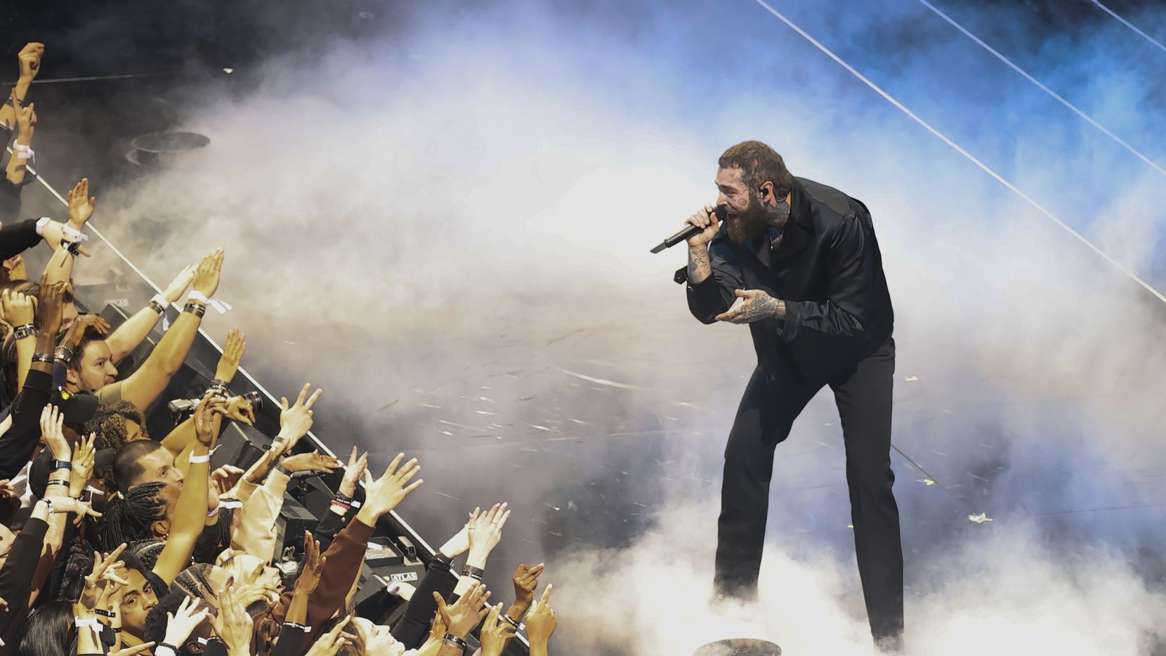 Post Malone playfully targets daughter's college costs with his new single,  tour and album