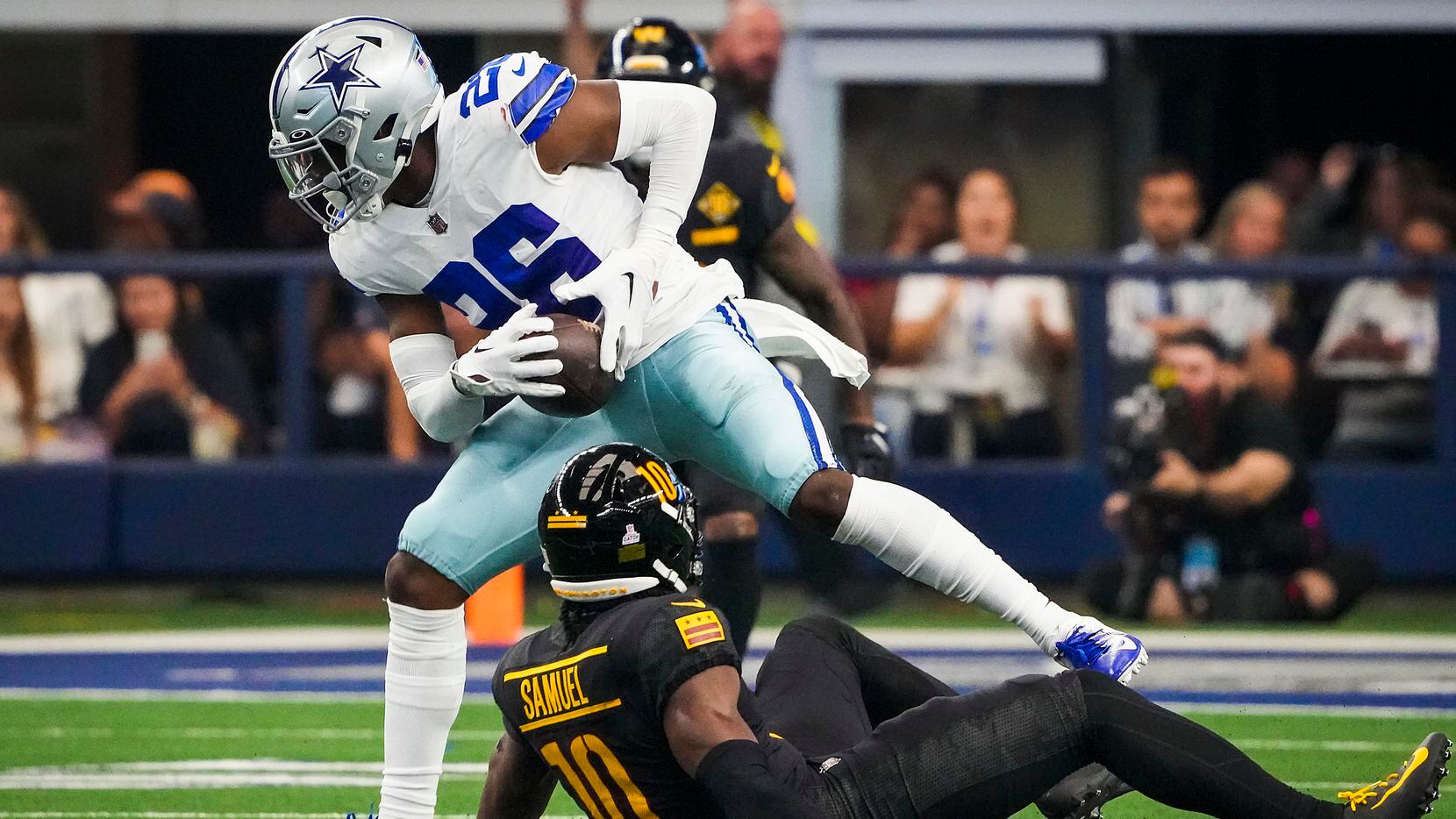 Dallas Cowboys cornerback DaRon Bland (26) intercepts a pass intended for Washington...