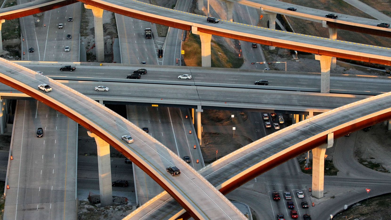 This is an aerial view of the Sam Rayburn Tollway as it crosses the Dallas North Tollway....