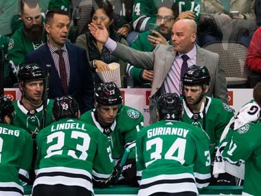 Dallas Stars head coach Jim Montgomery talks to his team during the second period of an NHL game between the Dallas Stars and the Chicago Blackhawks on Thursday, December 20, 2018 at American Airlines Center in Dallas. (Ashley Landis/The Dallas Morning News)
