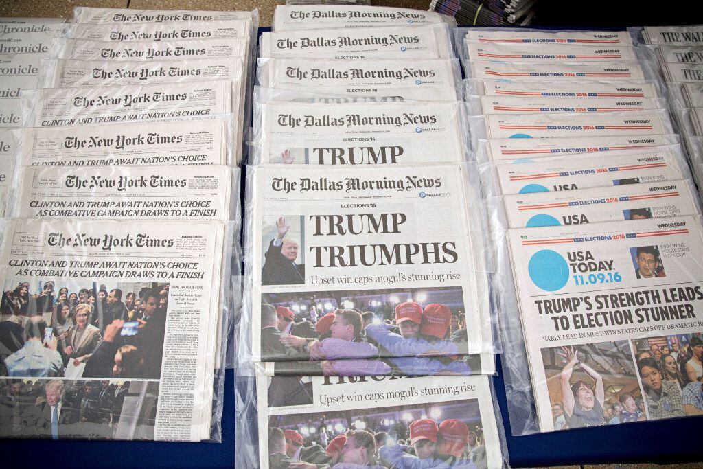 Newspapers showing the outcome of the 2016 presidential election were sold in front of The...