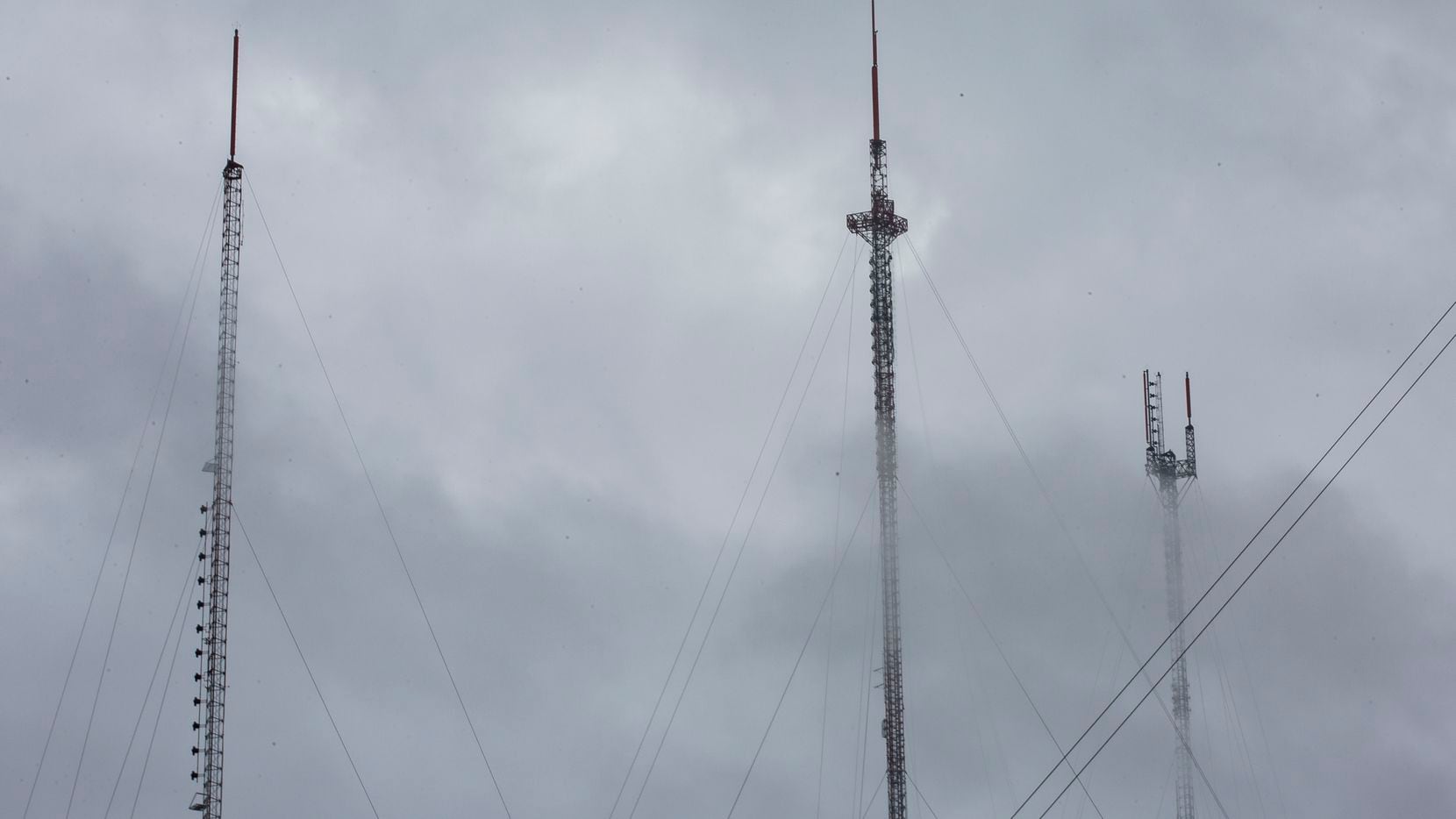 Antennas on towers on a high point in Dallas County are seen on Jan. 9, 2020 in Cedar Hill,...