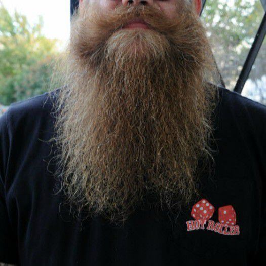 Troy Martin competes in a full beard natural competition.