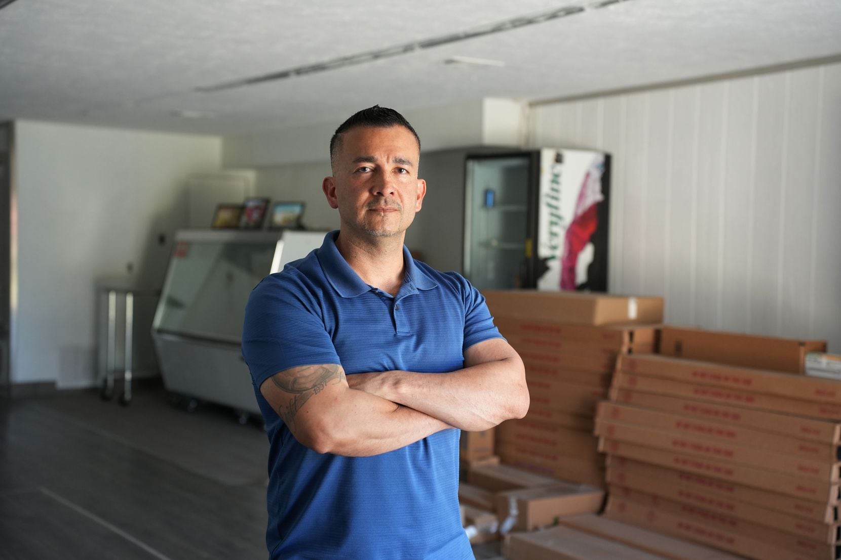 Jason Hernandez stands inside “La Tiendita” The Little Store in his old neighborhood in...