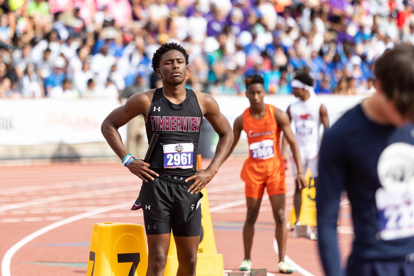 Cameron Bates of Mansfield Timberview prepares for the boys 4x100 relay at the UIL Track &...