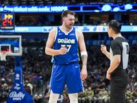 Dallas Mavericks guard Luka Doncic (77) argues for a call during the first half of an NBA...