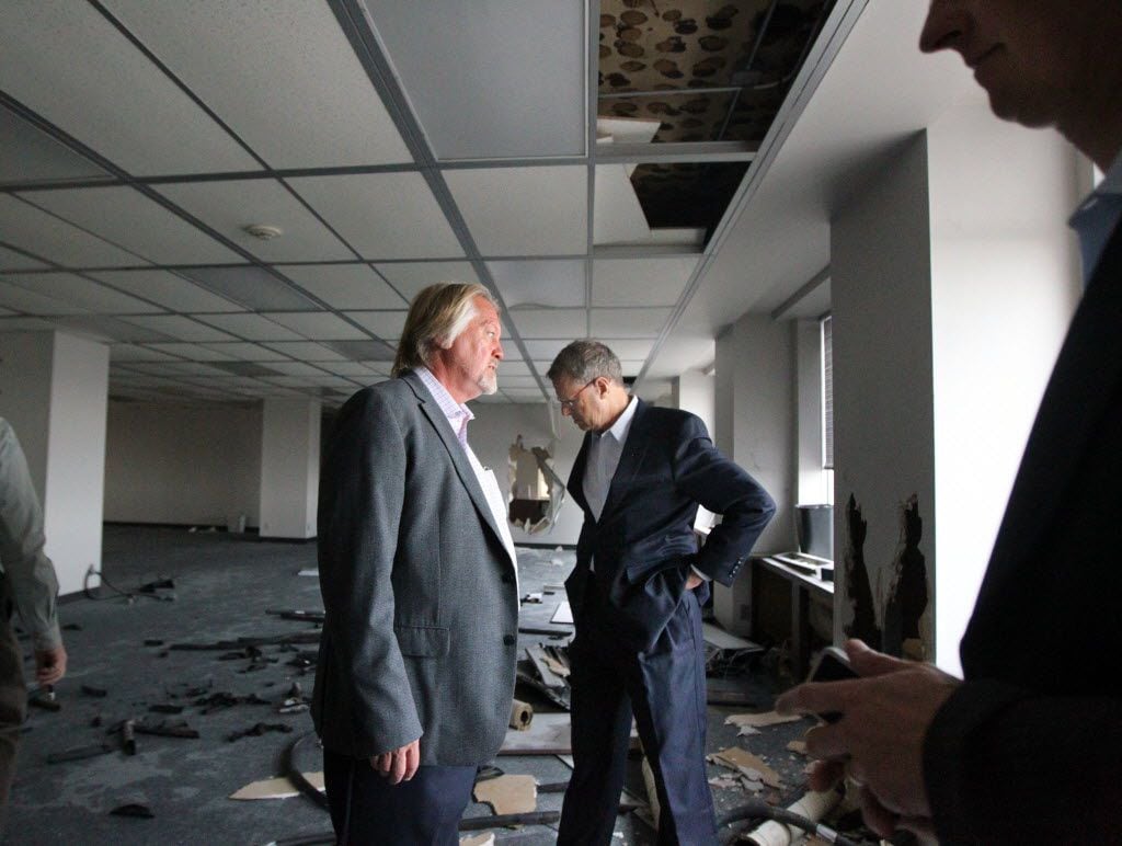 CitySquare's John Greenan, left, and Larry Hamilton toured one of the old Lone Star Gas buildings in downtown Dallas in April 2013.   (Mona Reeder/The Dallas Morning News)