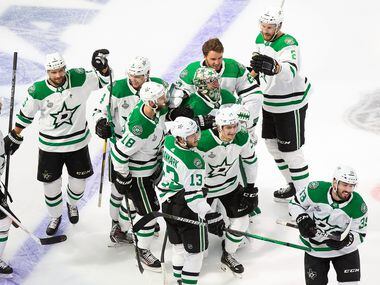 The Dallas Stars celebrate Corey Perry's game winning goal against the Tampa Bay Lightning during Game Five of the Stanley Cup Final at Rogers Place in Edmonton, Alberta, Canada on Saturday, September 26, 2020.