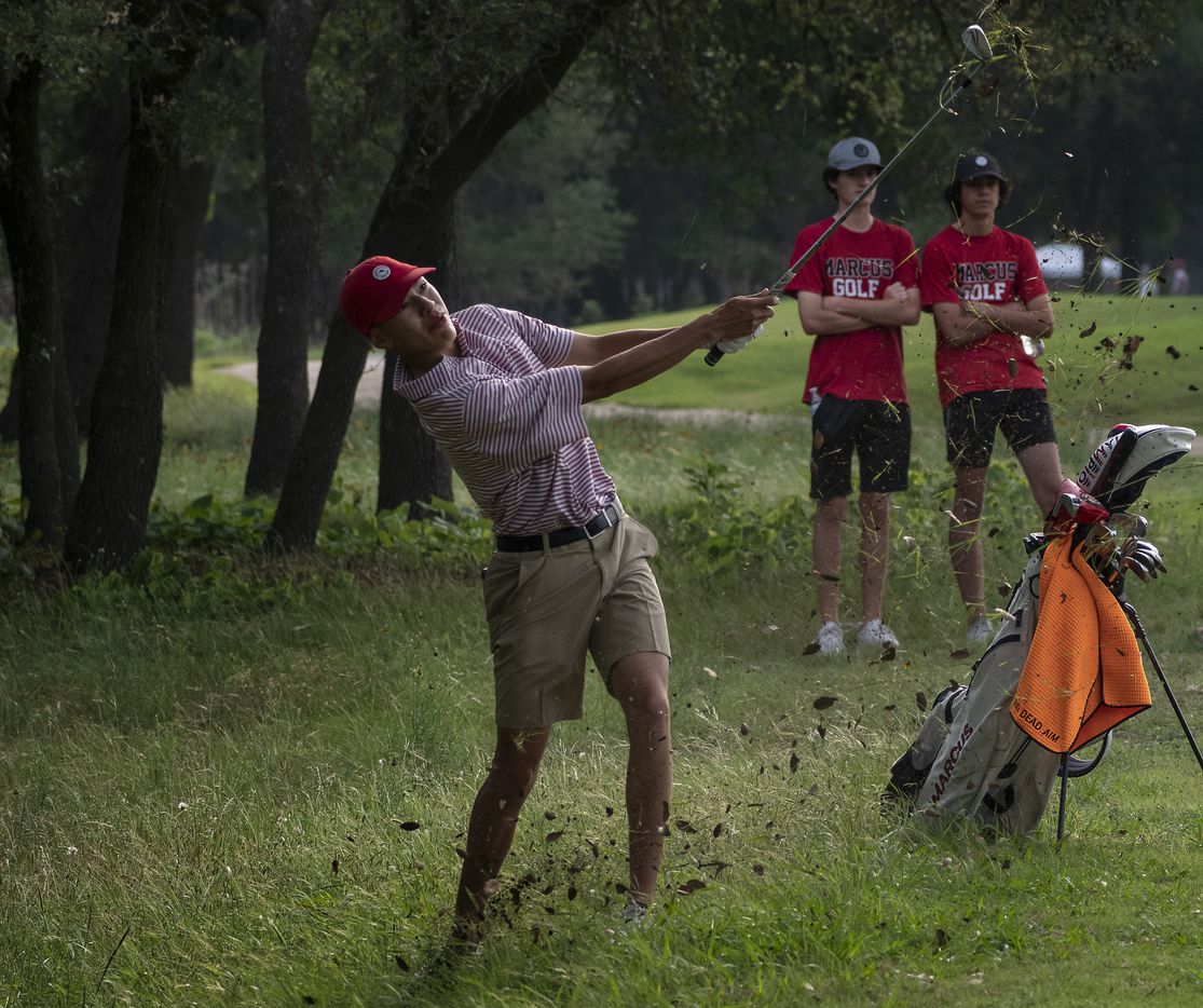 Flower Mound Marcus, Kenneth Melendrez hits out of the rough on the no.1 hole during the...