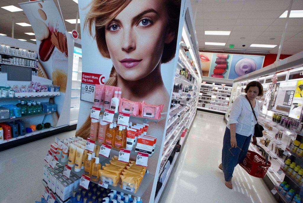 In this Aug. 21, 2015 photo, a woman shops in the cosmetics department in the CityTarget store in Boston. (AP Photo/Michael Dwyer) ORG XMIT: MAMD220