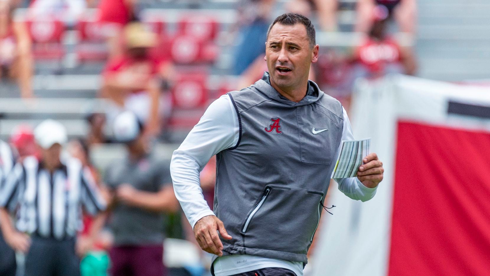 Alabama offensive coordinator Steve Sarkisian works his payers through drills during an NCAA...