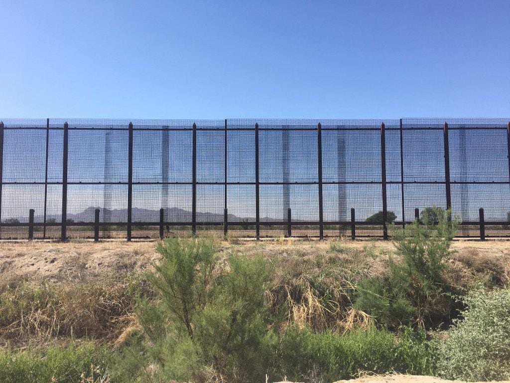 The border fence in Tornillo, Texas, is on private land owned by a West Texas pecan farmer....