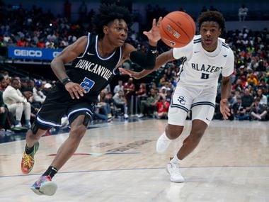 Duncanville's Ja'Bryant Hill  (2) drives past  Sierra Canyon's Bronny James (0) during their high school boys basketball game during the Thanksgiving Hoopfest in Dallas, Tx, Saturday, Nov. 30, 2019. (Michael Ainsworth)
