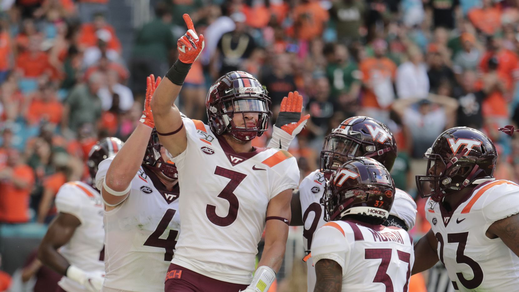 In this Oct. 5, 2019, file photo, Virginia Tech defensive back Caleb Farley (3) celebrates after intercepting a pass during the first half of the team's NCAA college football game against Miami in Miami Gardens, Fla.