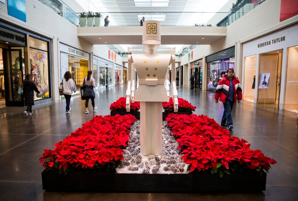 Large toy soldiers from past years were restored and painted white with the NorthPark logo...
