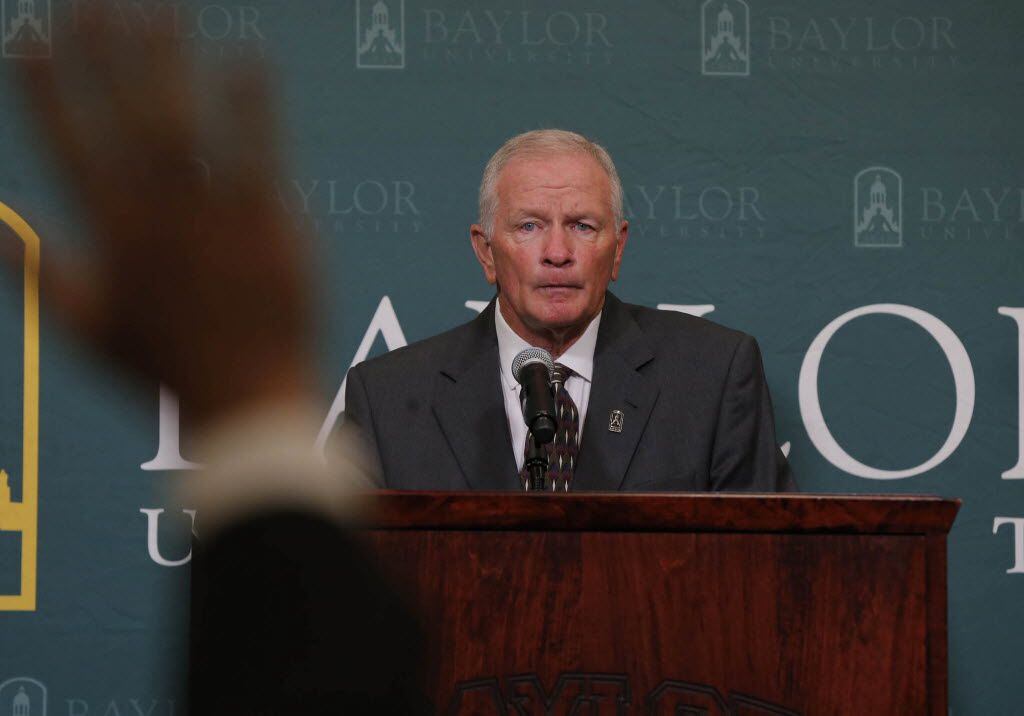 Baylor interim head football coach Jim Grobe talks with reporters during a news conference,...