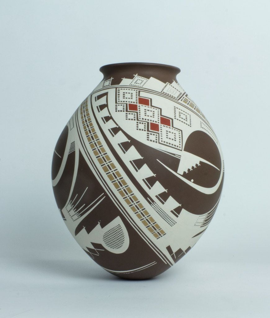 Pieces of Mata Ortiz pottery such as this one by artist Juan Quezada are included in the...