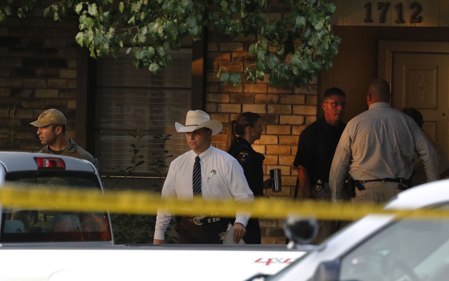 Plano police and the Texas Rangers work the scene of a shooting at a home in the 1700 block...