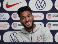 United States forward Jesus Ferreira speaks to reporters before an official training session...