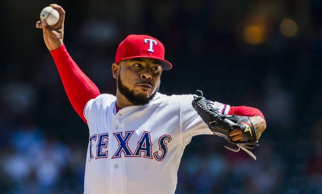 Texas Rangers reliever Jeremy Jeffress pitches during an Aug. 11 game against the Colorado...