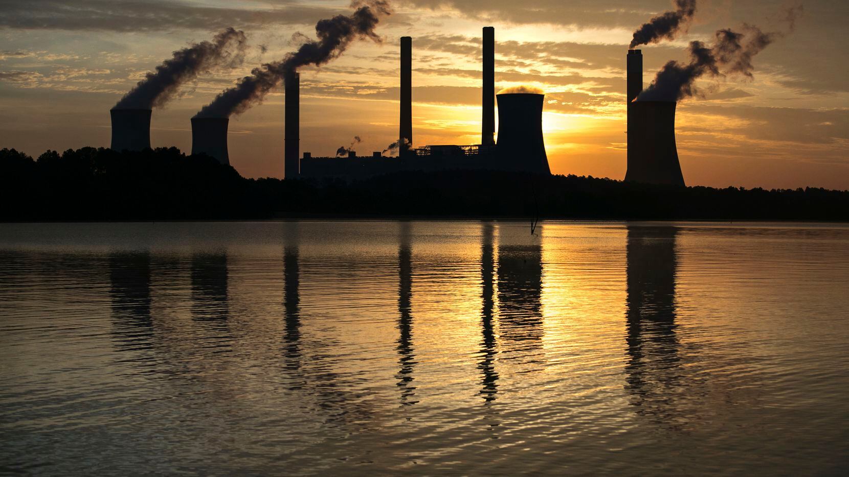 In this 2017 file photo, the coal-fired Plant Scherer, one of the nation's top carbon...