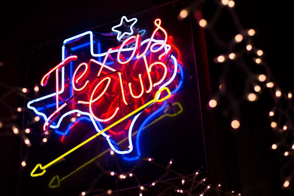 Neon signs light up the interior of Billy Bob's Texas in Fort Worth