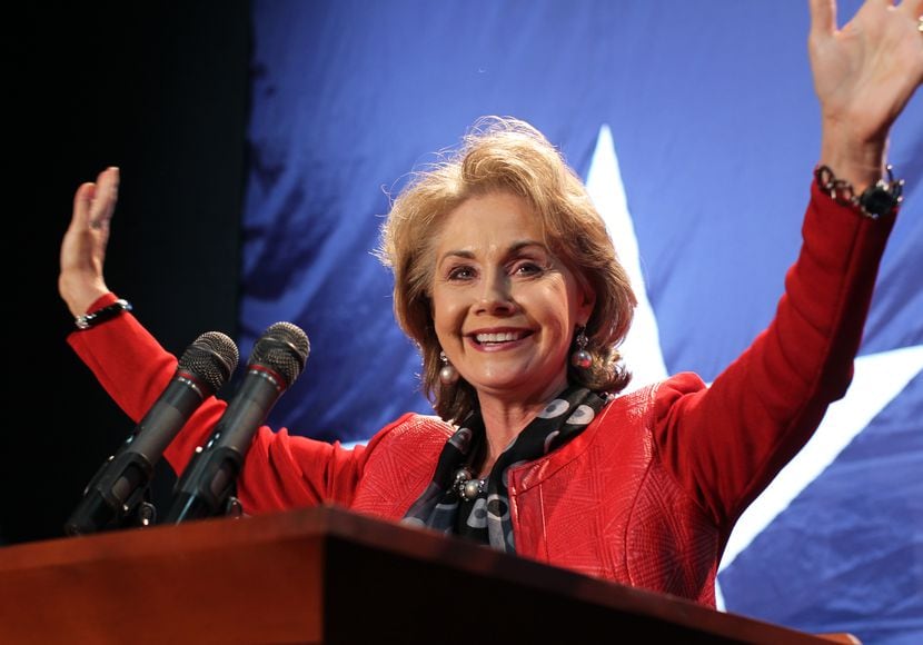 Justice Debra Lehrmann, shown at a 2010 victory party for Gov. Rick Perry, says her family...