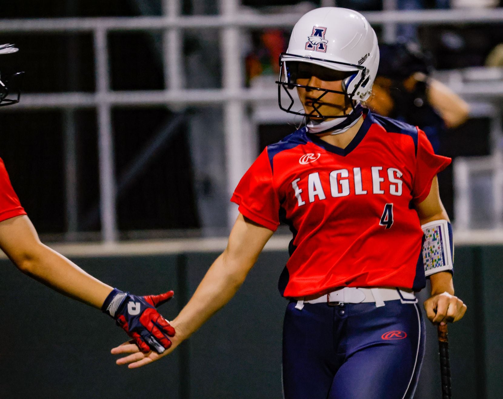 Allen's Sami Hood (4) celebrates running to home during the sixth inning of a District 5-6A...