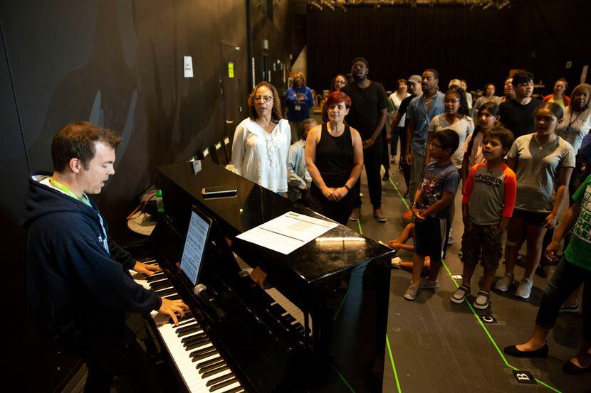 Jesse Fry plays piano during rehearsals of the Dallas Theater Center/Public Works Dallas...