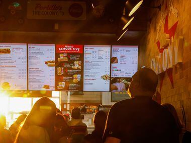 A line forms in the lobby of the new Portillo’s in The Colony to order on Monday, Jan. 9, 2023.