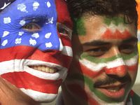 FILE - Mike Moscrop, left, from Orange County, Calif., poses with Amir Sieidoust, an Iranian...