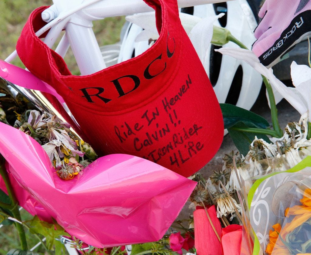 Messages and memorials are left at a ghost bike that sits at the southeast corner of Belt...