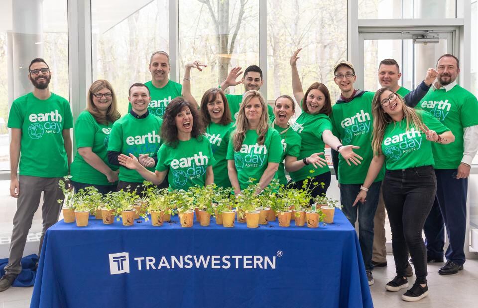 Transwestern workers gathered for a group shot on Earth Day.