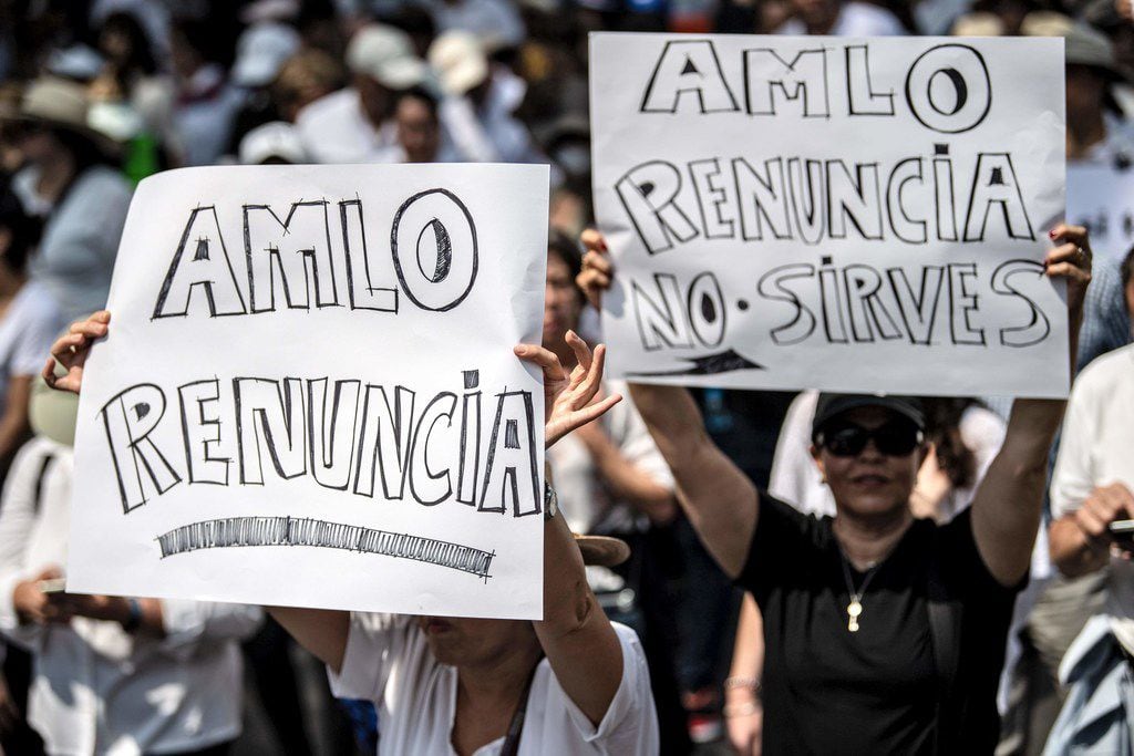 People take part in the so-called "March of Silence" against Mexican President Andres Manuel...