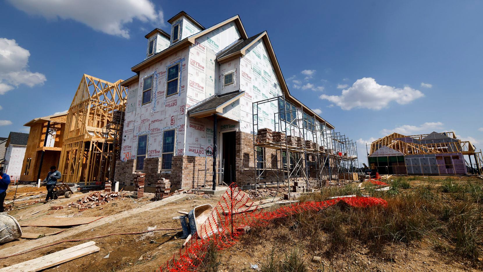 The first model homes are being built in Brookside, a community within Frisco's massive...