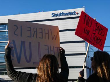 People gather to protest mandate on COVID-19 vaccines at Southwest Airlines headquartes in Dallas on Monday, October 18, 2021. (Lola Gomez/The Dallas Morning News)
