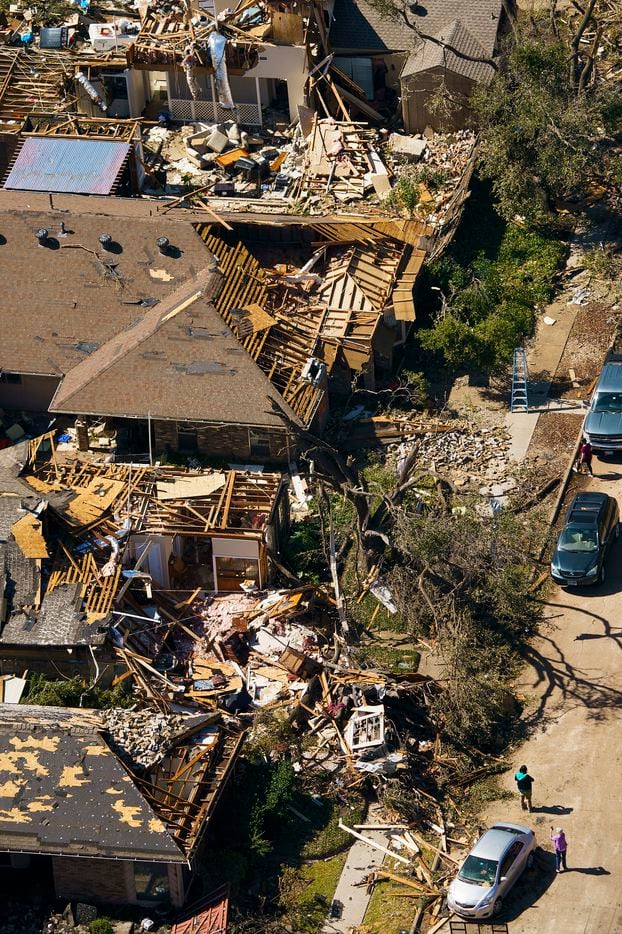 Damaged homes along Tall Oaks Drive on Monday, Oct. 21, 2019, in Richardson.