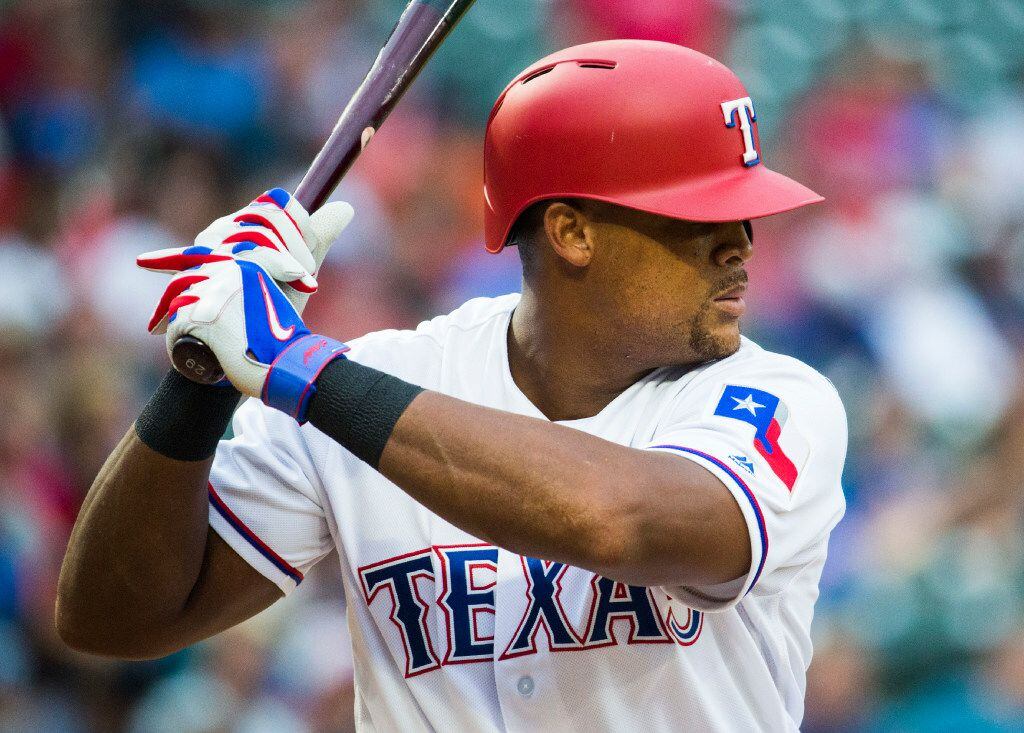 Texas Rangers third baseman Adrian Beltre (29) bats during the second inning of an MLB game...