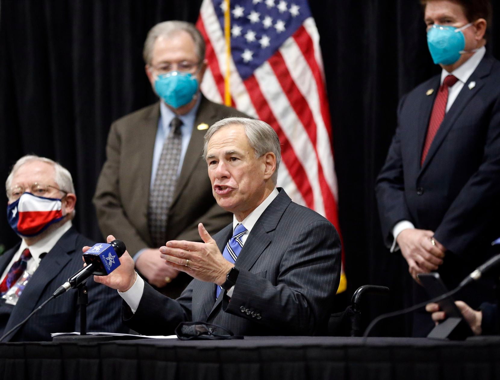 Alongside local and state officials, Texas Governor Greg Abbott provided an update on COVID-19 vaccine efforts in Texas following the tour of a mass COVID-19 vaccination site inside Esports Stadium Arlington & Expo Center in Arlington, Texas, Monday, January 11, 2021.  (Tom Fox/The Dallas Morning News) 