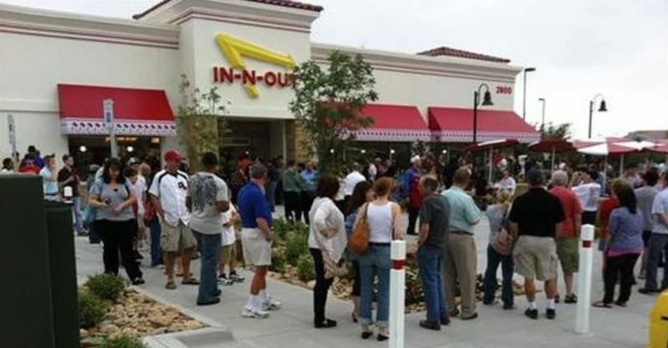 A crowd gathered outside the In-N-Out Burger in Frisco for its opening on May 11, 2011.