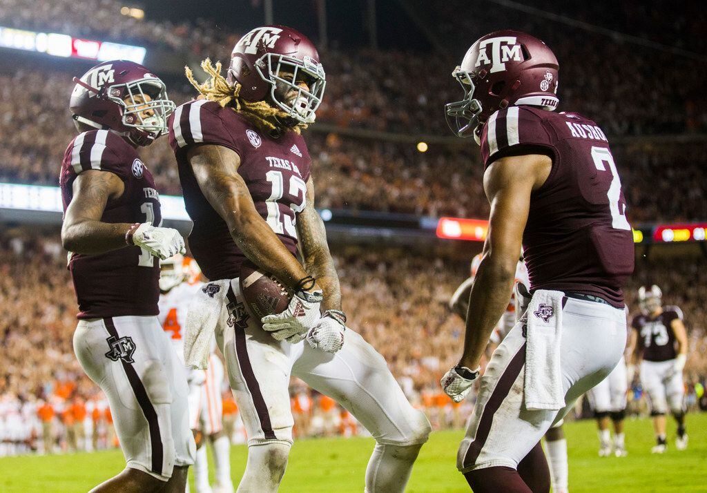 Texas A&M Aggies wide receiver Kendrick Rogers (13) celebrates after scoring a touchdown...