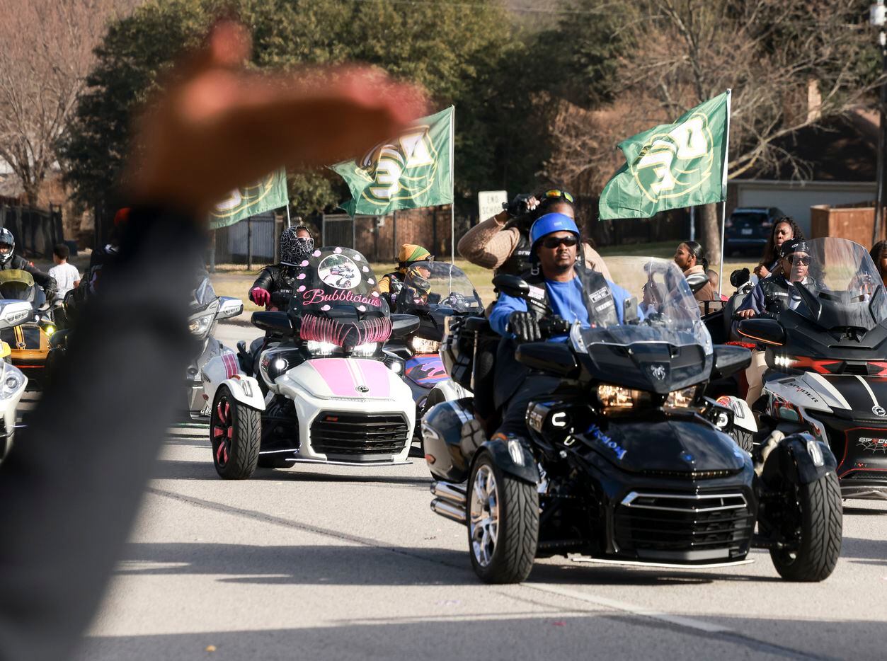 The Rolling Spyders of DFW drive down the street during the parade, Saturday, Jan. 21, 2023,...