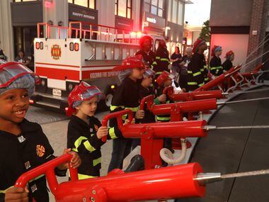 At KidZania in Stonebriar Centre, kids can experiment with professions such as firefighter.